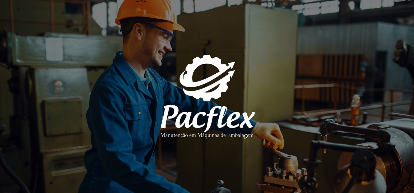 Worker in uniform and helmet works on lathe, factory. Industrial production, metalwork engineering, power machines manufacturing
